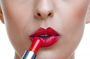 Image of applying lipstick